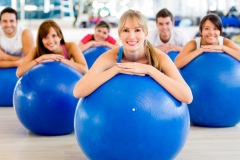 Group of people in a Pilates class at the gym